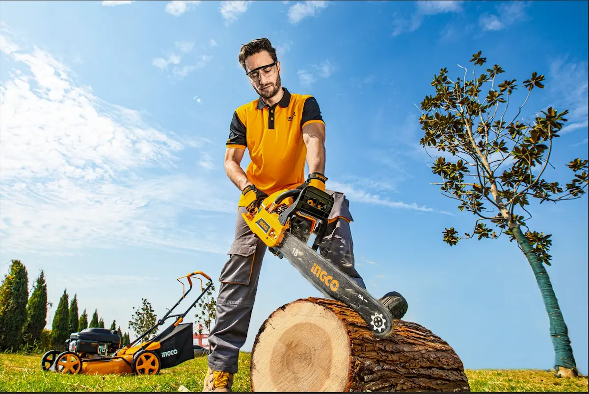 Log cutting with Ingco Tools and lawnmower.